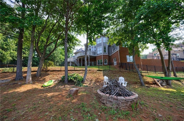 652 Pathview Ct, Dacula, GA 30019 - back of house with a fire pit