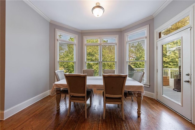 652 Pathview Ct, Dacula, GA 30019 - dining room featuring crown molding, baseboards, and wood finished floors