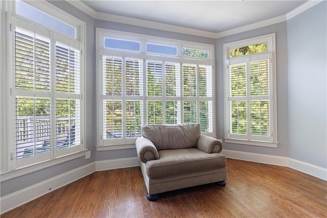 652 Pathview Ct, Dacula, GA 30019 - sitting room featuring baseboards, healthy amount of natural light, crown molding, and wood finished floors