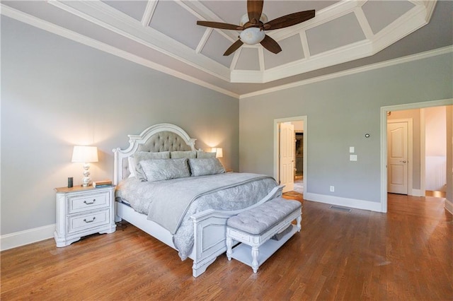 652 Pathview Ct, Dacula, GA 30019 - bedroom with baseboards, wood finished floors, crown molding, coffered ceiling, and a ceiling fan