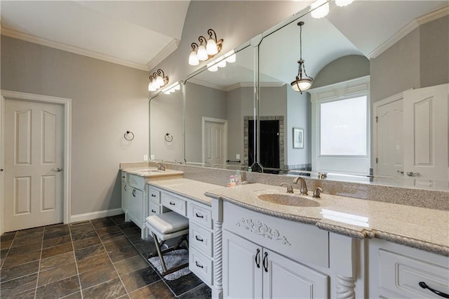 652 Pathview Ct, Dacula, GA 30019 - full bath featuring double vanity, baseboards, stone finish flooring, and crown molding