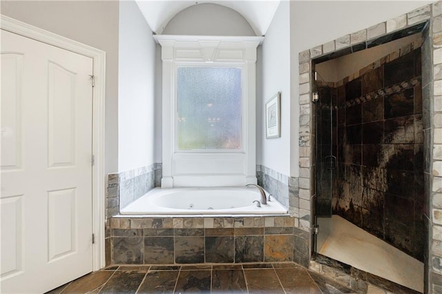 652 Pathview Ct, Dacula, GA 30019 - full bathroom with a shower stall, a whirlpool tub, and stone finish floors