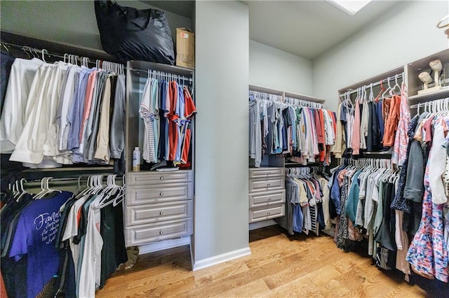 652 Pathview Ct, Dacula, GA 30019 - walk in closet featuring wood finished floors