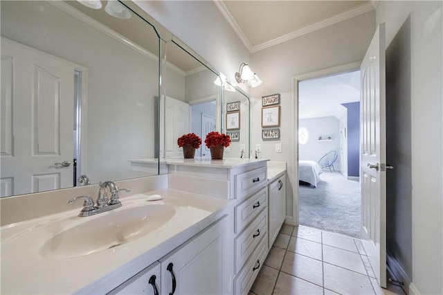 652 Pathview Ct, Dacula, GA 30019 - ensuite bathroom featuring double vanity, crown molding, tile patterned floors, and baseboards