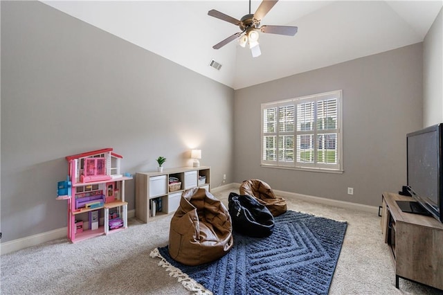 652 Pathview Ct, Dacula, GA 30019 - playroom with carpet floors, ceiling fan, baseboards, and high vaulted ceiling