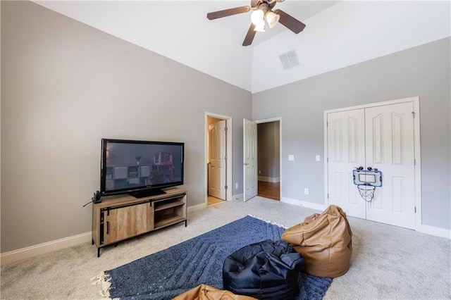 652 Pathview Ct, Dacula, GA 30019 - sitting room with high vaulted ceiling, a ceiling fan, carpet flooring, and baseboards