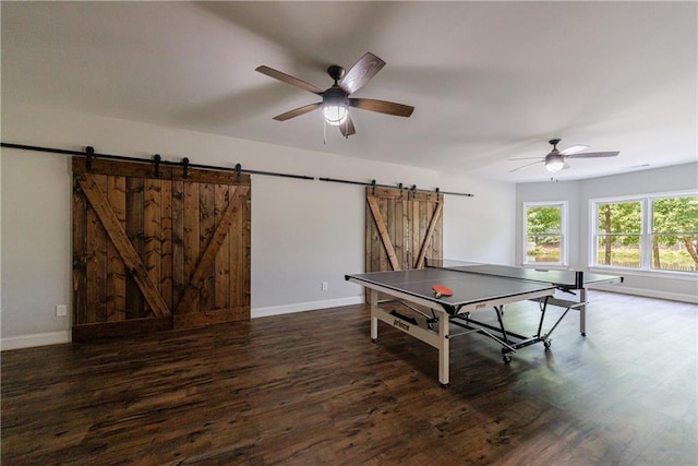 652 Pathview Ct, Dacula, GA 30019 - playroom with a barn door, a ceiling fan, wood finished floors, and baseboards