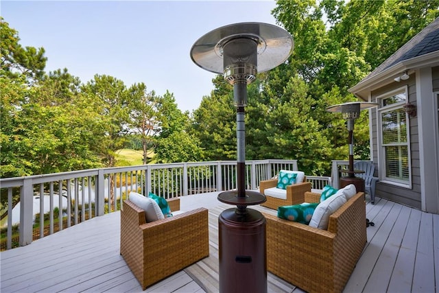 652 Pathview Ct, Dacula, GA 30019 - deck with an outdoor living space and view of wooded area