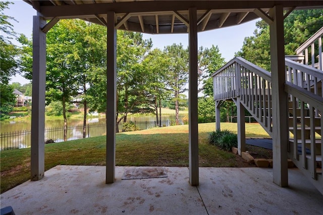 652 Pathview Ct, Dacula, GA 30019 - view of patio featuring stairway, a deck with water view, and view of wooded area
