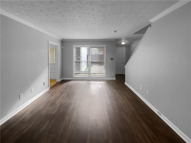 unfurnished living room with baseboards, wood finished floors, and ornamental molding