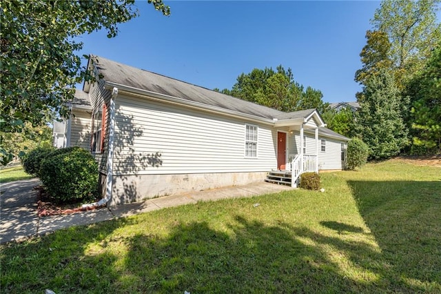 exterior space with a yard