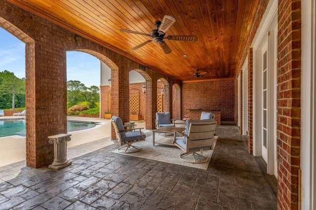 view of patio with ceiling fan