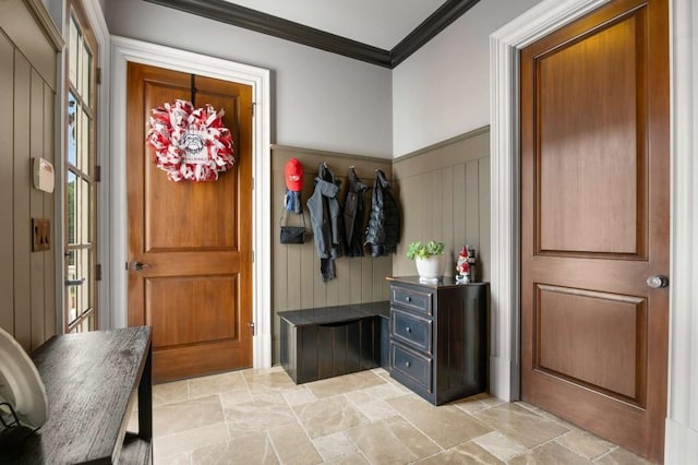 mudroom featuring ornamental molding