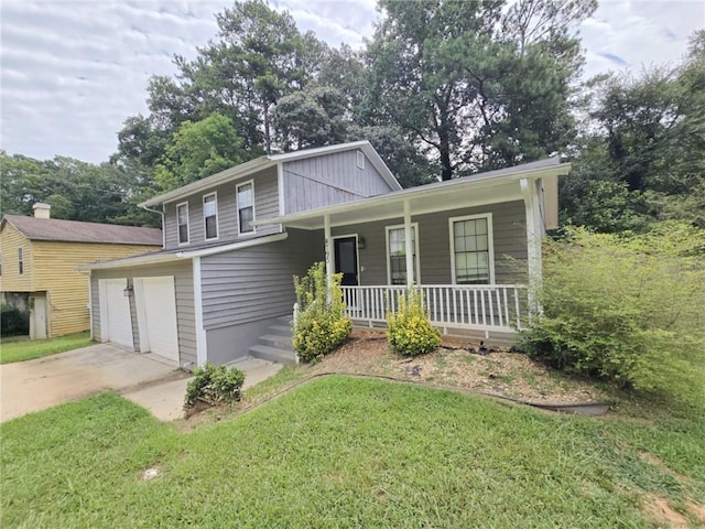 split level home with a front yard and a porch