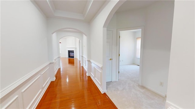 corridor with light colored carpet