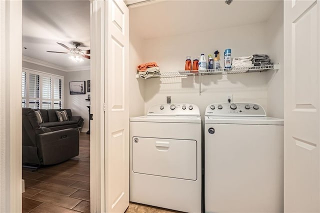 laundry area featuring laundry area, ceiling fan, light wood-style floors, ornamental molding, and washing machine and dryer