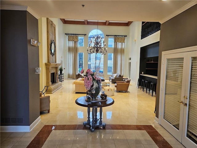 3777 Peachtree Rd NE Unit 412, Brookhaven, GA 30319 - building lobby featuring a high ceiling, ornamental molding, and beam ceiling