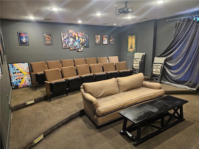 carpeted cinema with recessed lighting and visible vents