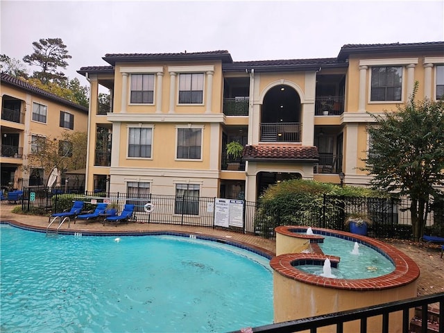 community pool with fence