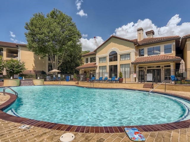 community pool with fence