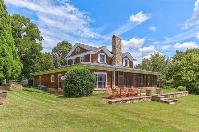 6302 J F Jay Rd, Gainesville, GA 30506 - back of house featuring a sunroom, a chimney, a yard, and cooling unit