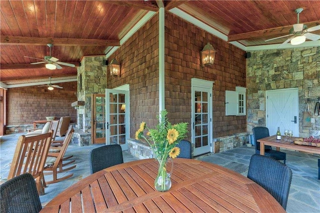 6302 J F Jay Rd, Gainesville, GA 30506 - wooden terrace with outdoor dining area, a ceiling fan, and an outdoor fireplace