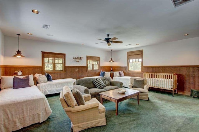 6302 J F Jay Rd, Gainesville, GA 30506 - carpeted bedroom with wainscoting, wood walls, recessed lighting, and a ceiling fan