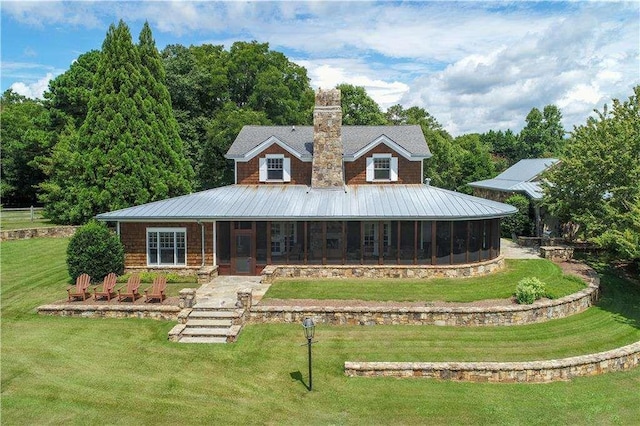 6302 J F Jay Rd, Gainesville, GA 30506 - view of front of property featuring a front yard, metal roof, a chimney, and a sunroom