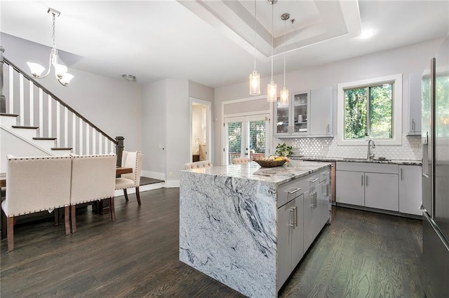 482 Pearl Cove Ct, Atlanta, GA 30350 - kitchen with a sink, dark wood finished floors, decorative backsplash, and healthy amount of natural light