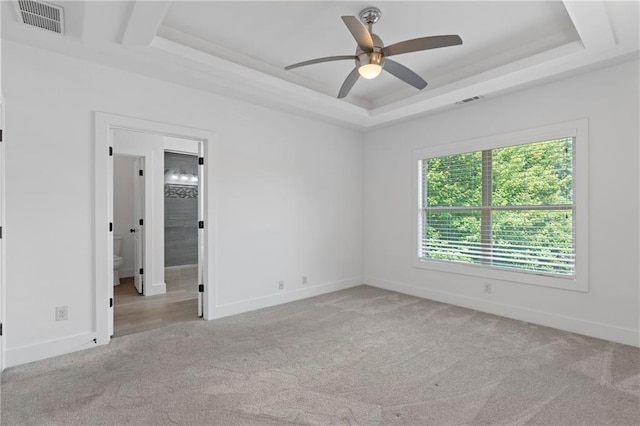 482 Pearl Cove Ct, Atlanta, GA 30350 - carpeted spare room with a ceiling fan, a raised ceiling, and baseboards