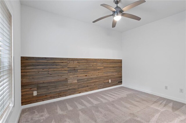 482 Pearl Cove Ct, Atlanta, GA 30350 - spare room featuring carpet flooring, a ceiling fan, and baseboards