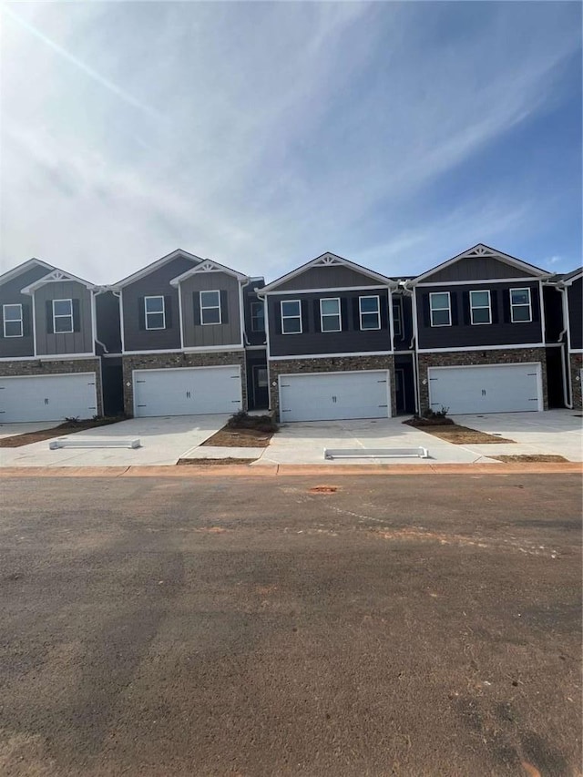 view of front of home featuring driveway and an attached garage