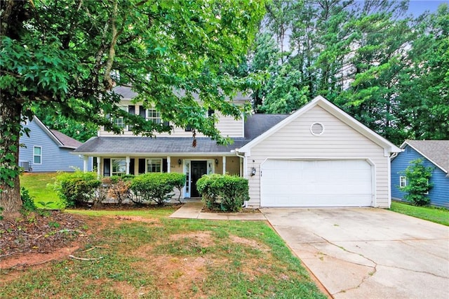 view of front facade with a front lawn and a garage