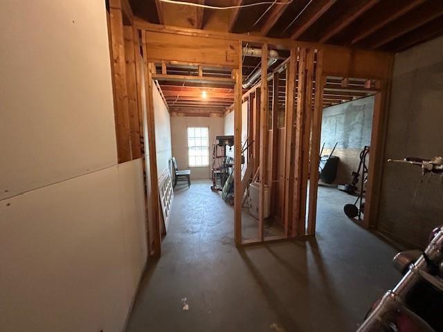 interior space featuring concrete flooring