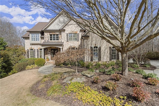 view of front facade featuring stone siding