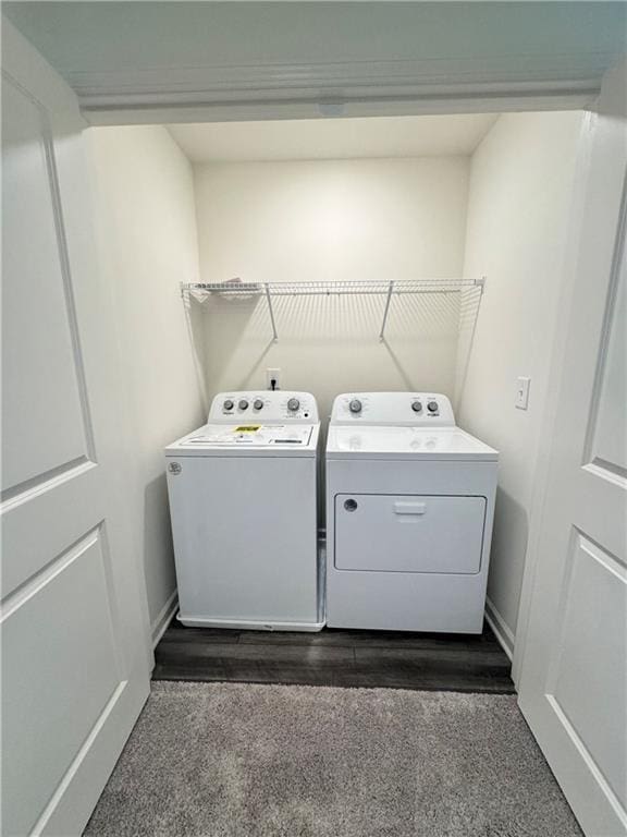 283 Rydal Way, Winder, GA 30680 - laundry area with washing machine and dryer and dark carpet