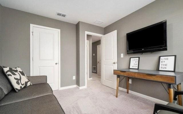283 Rydal Way, Winder, GA 30680 - living room with light carpet and baseboards