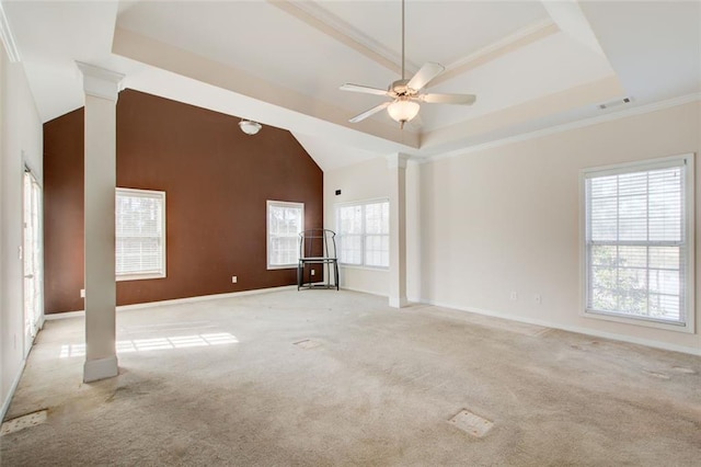 unfurnished room featuring visible vents, light carpet, a ceiling fan, a tray ceiling, and ornate columns