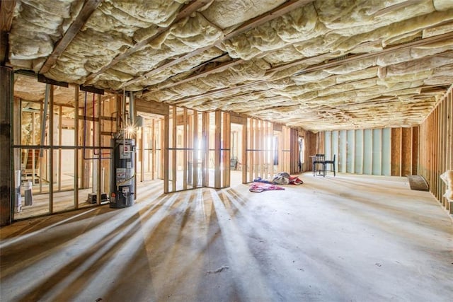 miscellaneous room featuring secured water heater