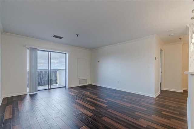 spare room with dark hardwood / wood-style flooring and crown molding