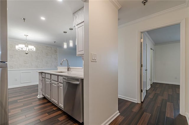 kitchen featuring dishwasher, dark hardwood / wood-style flooring, white cabinetry, and sink