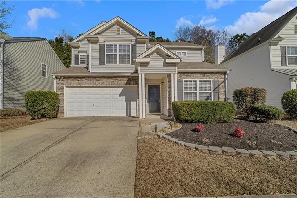 front of property featuring a garage