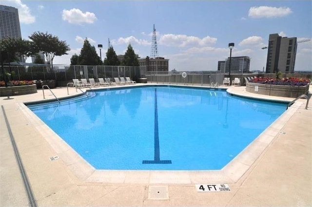 community pool with fence