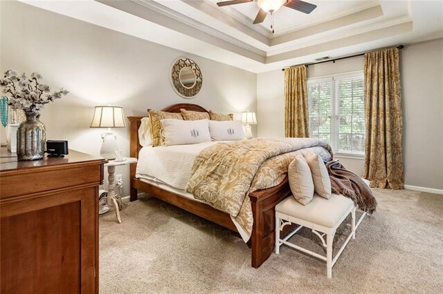 4401 Madison Woods Dr NW, Marietta, GA 30064 - bedroom featuring light colored carpet, crown molding, a tray ceiling, and a ceiling fan