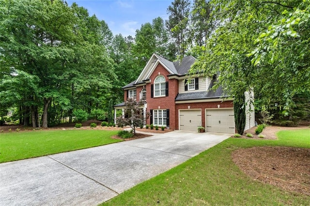 4401 Madison Woods Dr NW, Marietta, GA 30064 - view of front of house featuring driveway, brick siding, an attached garage, and a front yard