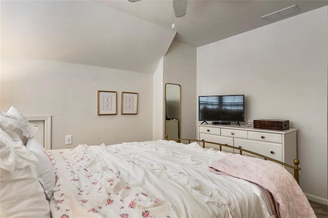 4401 Madison Woods Dr NW, Marietta, GA 30064 - carpeted bedroom featuring vaulted ceiling and a ceiling fan