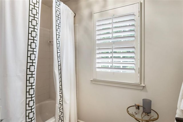 4401 Madison Woods Dr NW, Marietta, GA 30064 - bathroom with shower / bath combo and baseboards