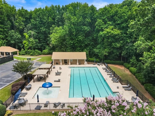 4401 Madison Woods Dr NW, Marietta, GA 30064 - community pool with a gazebo, a patio area, and a wooded view