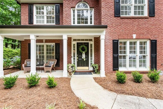 4401 Madison Woods Dr NW, Marietta, GA 30064 - property entrance with covered porch and brick siding