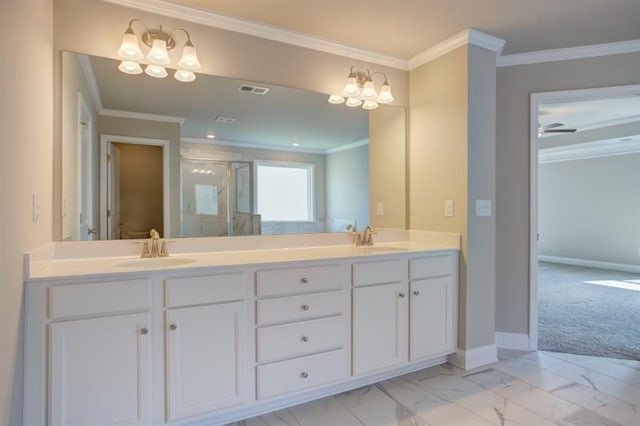 bathroom featuring a shower with door, vanity, and ornamental molding